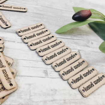 2724-2 Декоративная бирка бежевая - кож.зам.  40x12мм